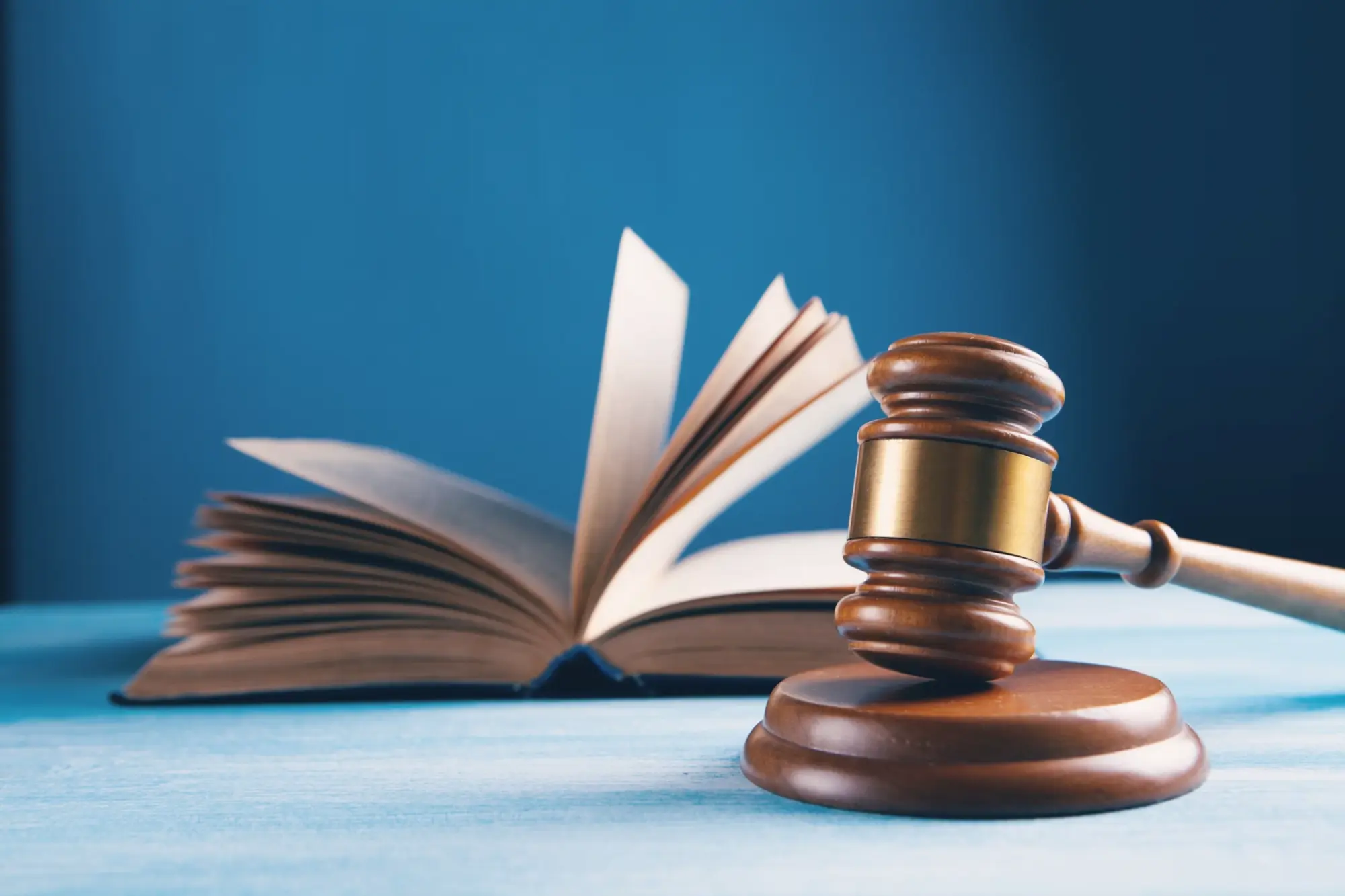 a gavel and open book.